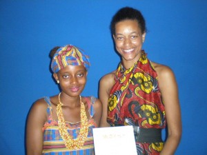 Christina presenting a certificate to student Mary